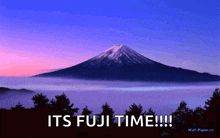 a picture of a mountain with the words " its fuji time " written below it