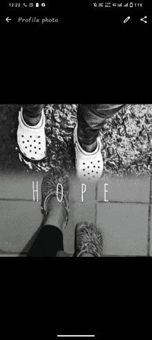 a black and white photo of a person 's feet with the word hope written above them