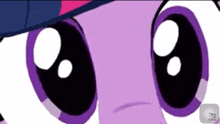 a close up of twilight sparkle 's eyes in a cartoon