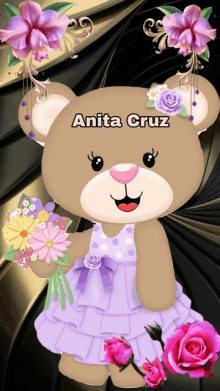 a teddy bear with flowers and the name anita cruz written on it