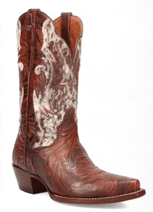 a pair of brown and white cowhide cowboy boots