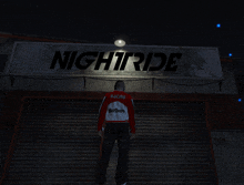 a man standing in front of a nightride store