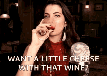 a woman drinking a glass of wine with the words want a little cheese with that wine