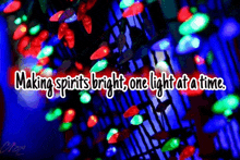 a sign that says " making spirits bright one light at a time " with christmas lights in the background