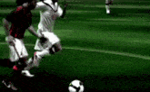 a soccer player wearing a white jersey with the letter c on it kicks the ball