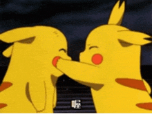 a couple of pikachu kissing each other with chinese characters on the bottom