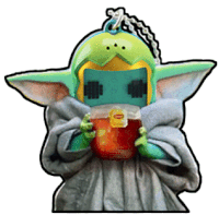 a baby yoda with a helmet on is holding a cup of tea .