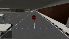 a stop sign is in the middle of a tunnel