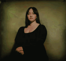 a painting of a woman in a black dress