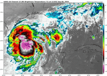 a satellite image of a tropical cyclone with tropicalbites.com written on the bottom