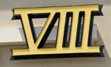 a yellow and black sign that says viii