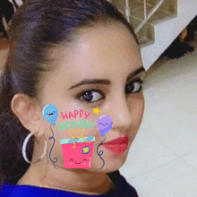 a woman 's face has a happy birthday sticker on it