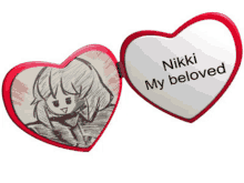 a heart shaped mirror with a picture of a girl and the words nikki my beloved