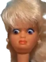 a close up of a barbie doll 's face with a surprised look on her face