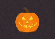 a halloween pumpkin with a glowing face on a dark background