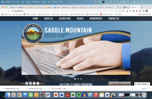 a computer screen shows the saddle mountain united school district