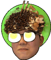 a man wearing glasses and a green hat with noodles on it