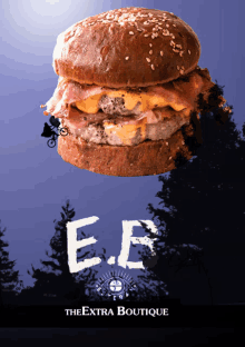 an advertisement for the extra boutique shows a hamburger floating in the air