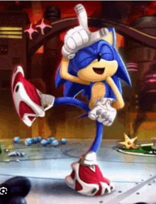 a cartoon character named sonic the hedgehog is wearing a hat and gloves and dancing on a stage .