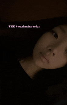 a close up of a woman 's face with the words " the #wasianinvasion " below her