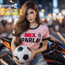 a woman wearing a pink shirt that says mix parlay holds a soccer ball in front of a motorcycle