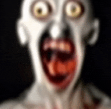 a close up of a zombie 's face with his mouth open