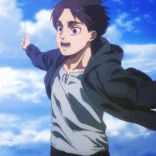 a young boy with his arms outstretched in front of a cloudy sky