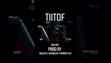 a video of a man wearing headphones and a microphone that says tiitof on it