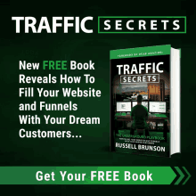 a book titled traffic secrets shows a man sitting at a desk