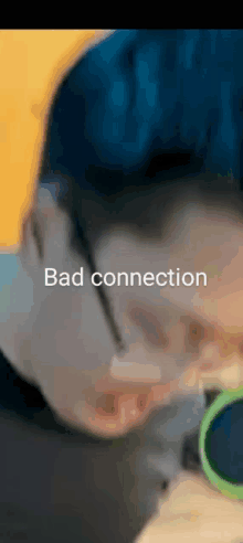 a close up of a person 's face with the words `` bad connection '' written in the corner .