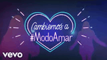 a neon sign with a heart and the words cambiamos a modo amar