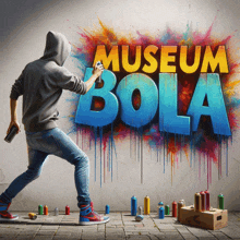 a man spray paints the words museum bola on a wall