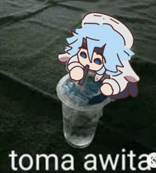 a cartoon character is sitting in a plastic cup with the words toma awita below it