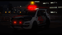 a police car with a red light on the top of it