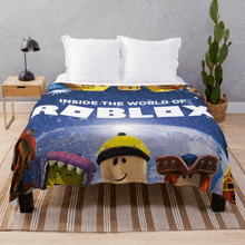 a bed with a roblox blanket on it