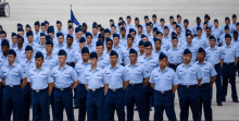 a large group of men in military uniforms are lined up