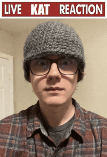 a man wearing glasses and a knitted hat with the words live kat reaction above him