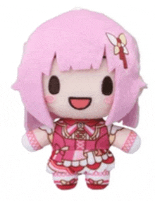 a stuffed doll with pink hair and a bow on her head