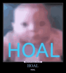 a blurry picture of a baby with the word hoal written on it