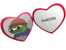 a heart shaped mirror with a green frog on it and the name fred239i