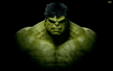 a close up of the face of a green hulk