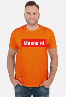 a man wearing an orange t-shirt with the words masno ni on it