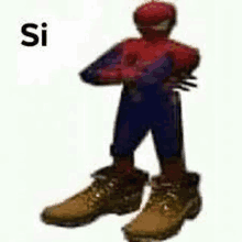 a spider man is wearing a pair of brown boots .