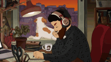 a man wearing headphones sits at a desk with a dog and a mug with music notes on it