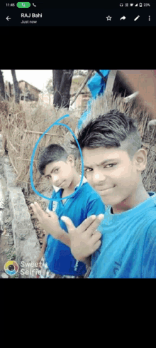 two boys are posing for a picture and one of them has a circle around his head