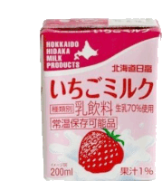 a carton of hokkaido hidaka milk products with strawberries on it