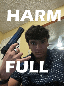 a man is holding a gun in front of a sign that reads harm full