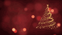 a christmas tree made of gold sparkles on a red background