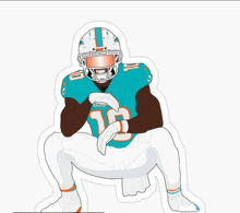 a miami dolphins football player is squatting down with his hands on his knees