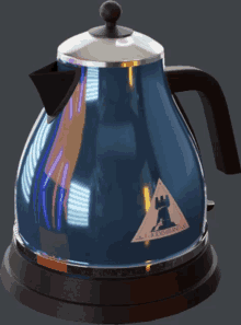 a blue electric kettle with a castle on the side of it